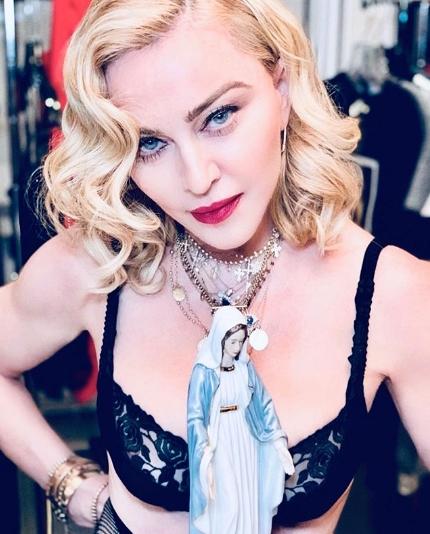 Поклонник хочет судиться с Мадонной из-за ее опоздания